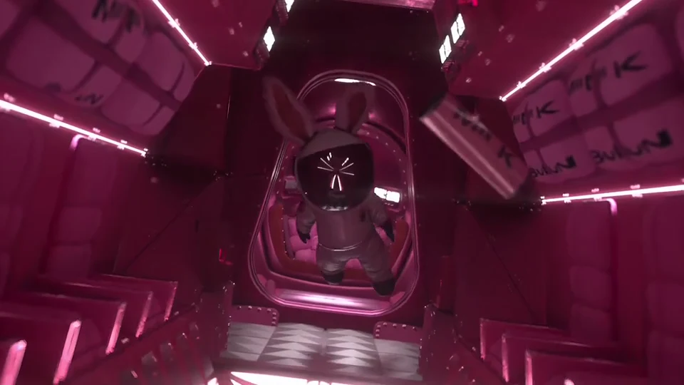 The rabbit astronaut floating toward the camera through a pink-lit spacecraft corridor, from the animation reel